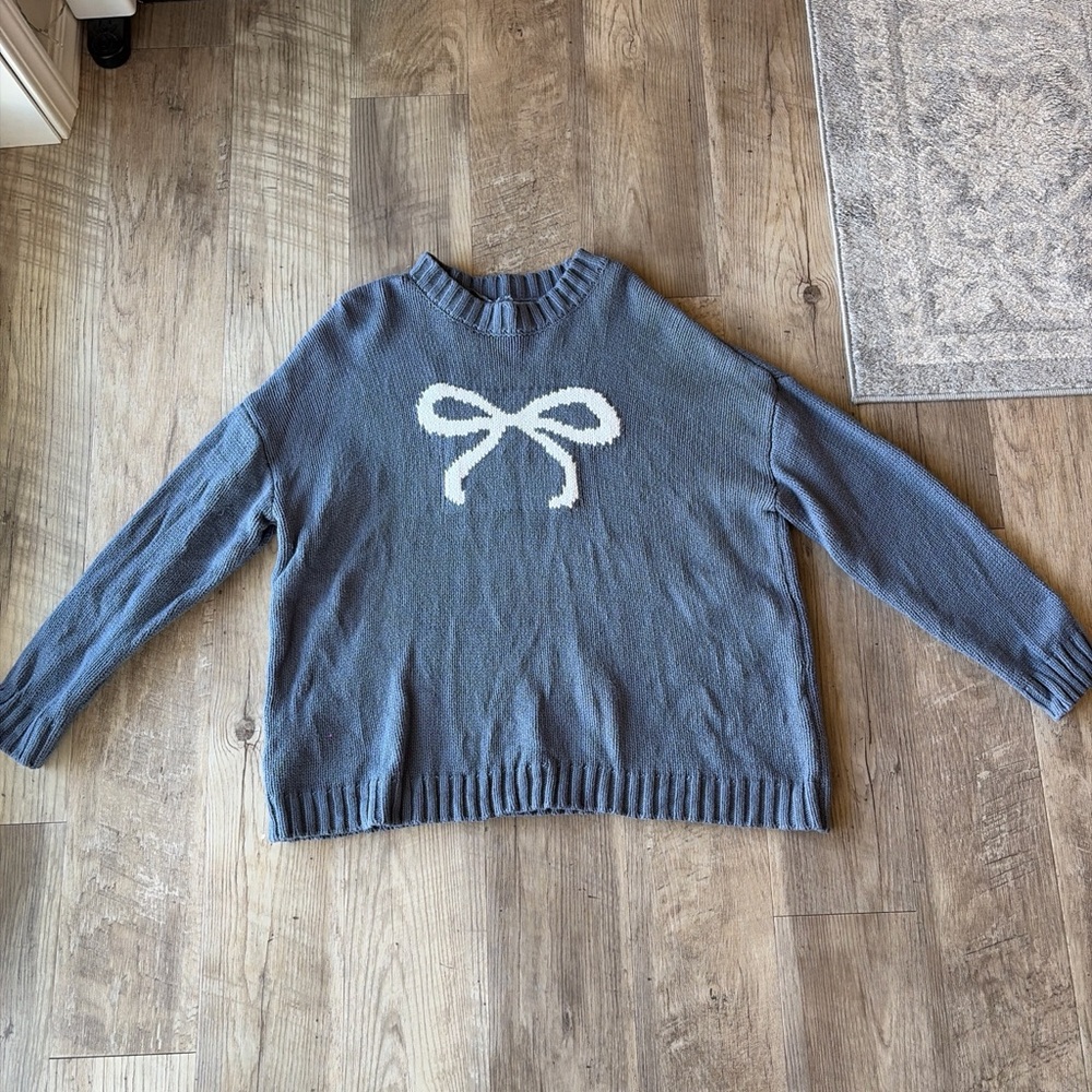 Women's Blue Sweater with Bow Design